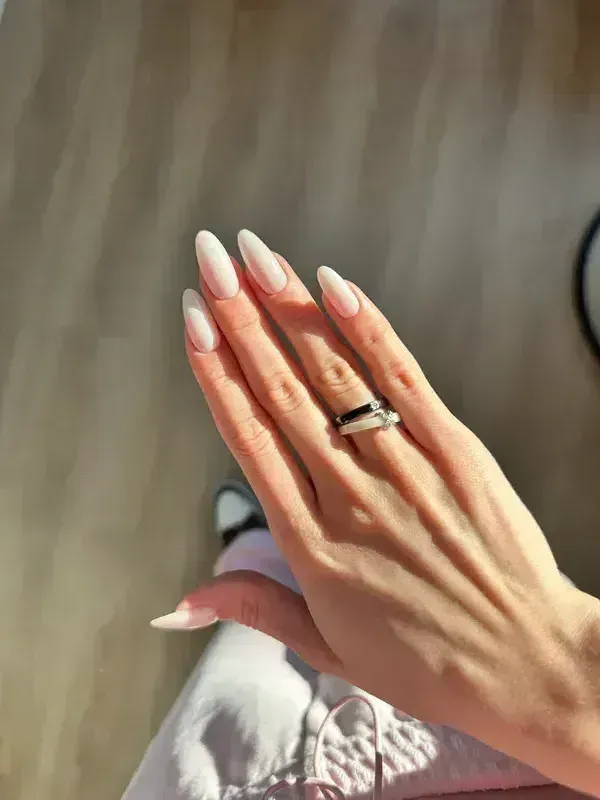 Long almond nails in milky white