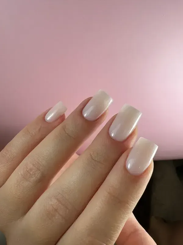 Square nails with a pearl chrome finish